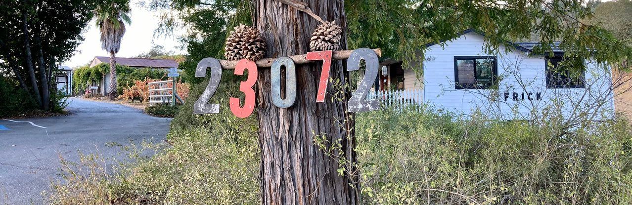 Address numbers 23072 on tree outside Frick tasting house