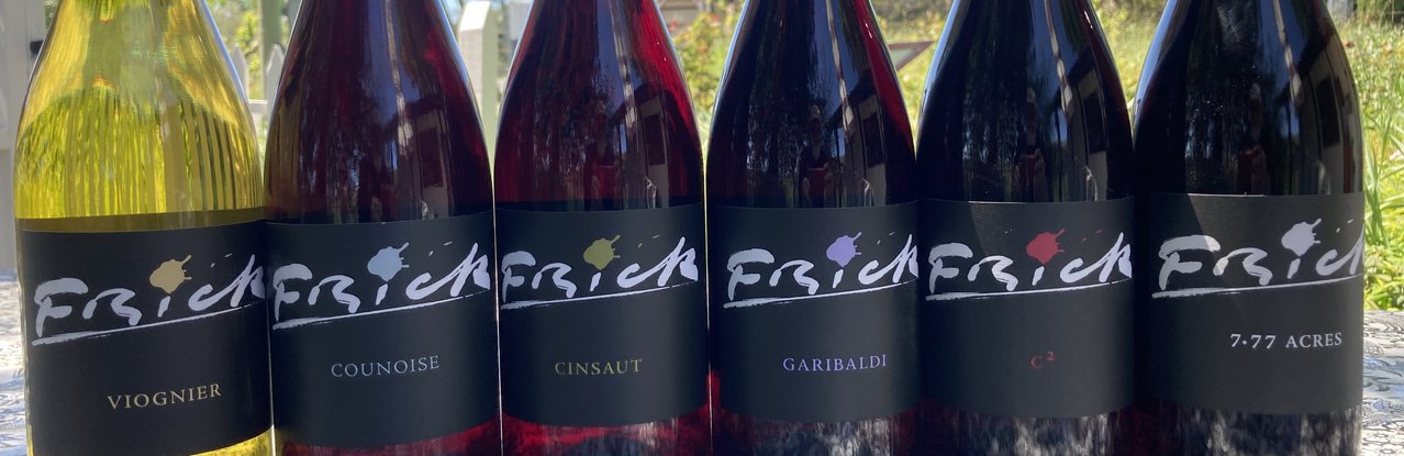 Row of 6  Frick Wine Bottles