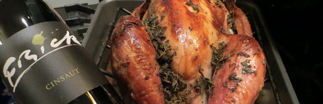 cinsaut bottle with roast chicken